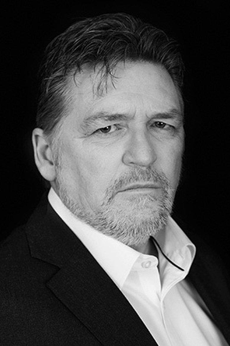Tim J. Henley Portrait of Tim J. Henley