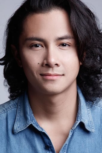 Portrait of JC Santos