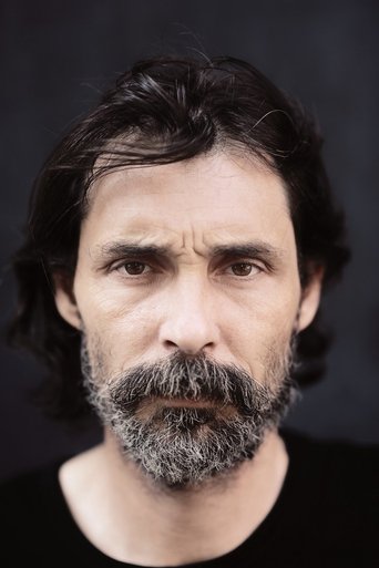 Portrait of Erdal Beşikçioğlu