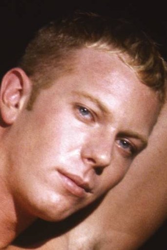 Portrait of Dax Kelly