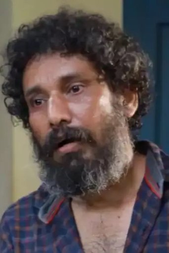 Portrait of Vinod Thomas
