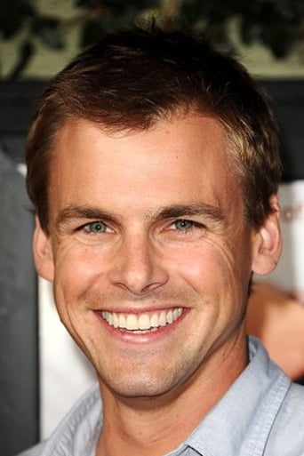 Portrait of Tommy Dewey