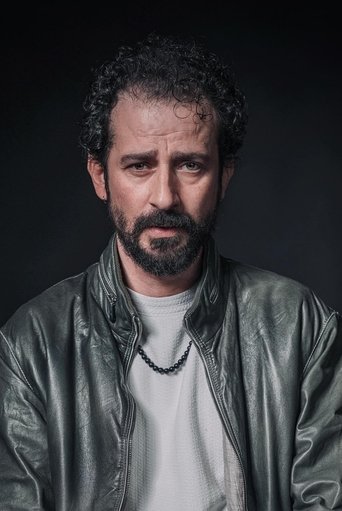 Portrait of Özay Özgüler