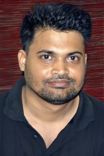 Portrait of M. Ravikumar