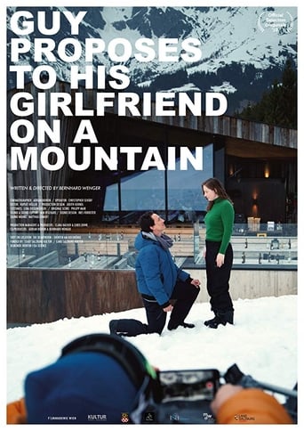 Poster of Guy Proposes To His Girlfriend On A Mountain