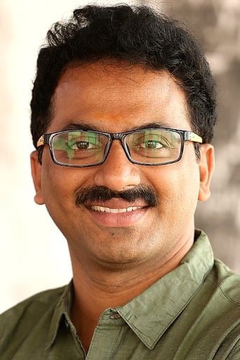 Portrait of Ashok G.