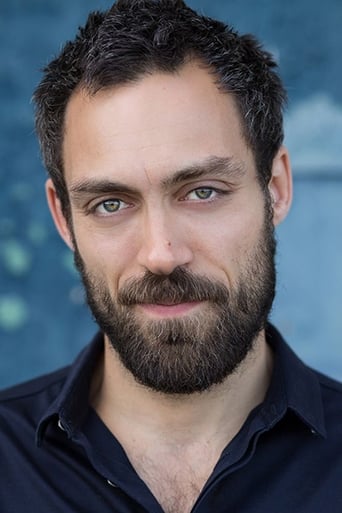 Portrait of Alex Hassell