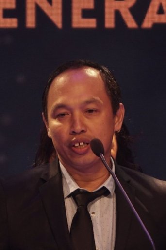 Portrait of Alex Tomboc