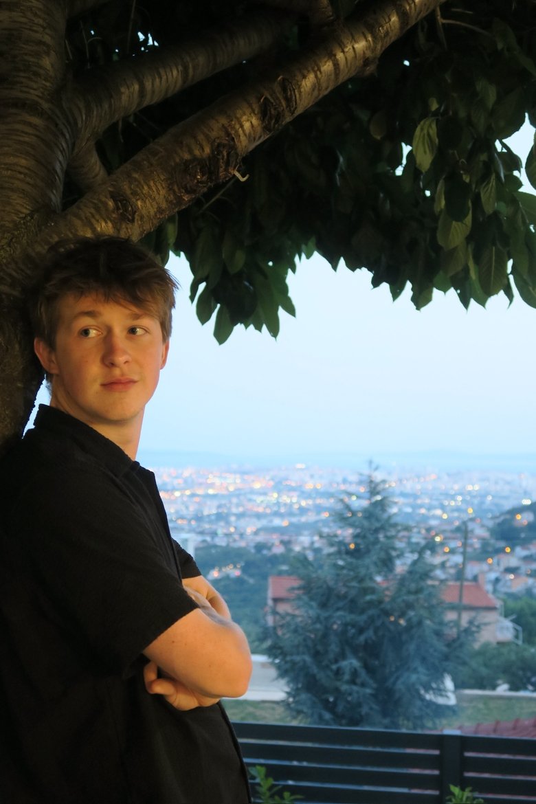 Portrait of Alex Newman